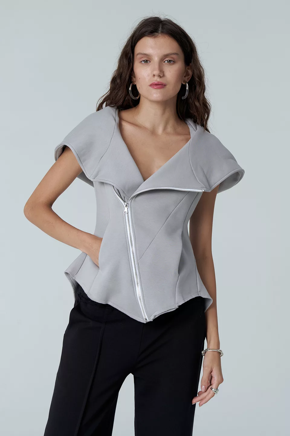 Light-gray vest with a hem